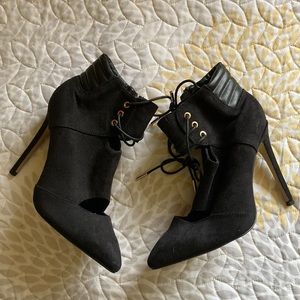 Migato NWOT black high heel ankle boots size 38 never worn. Bought in Greece.